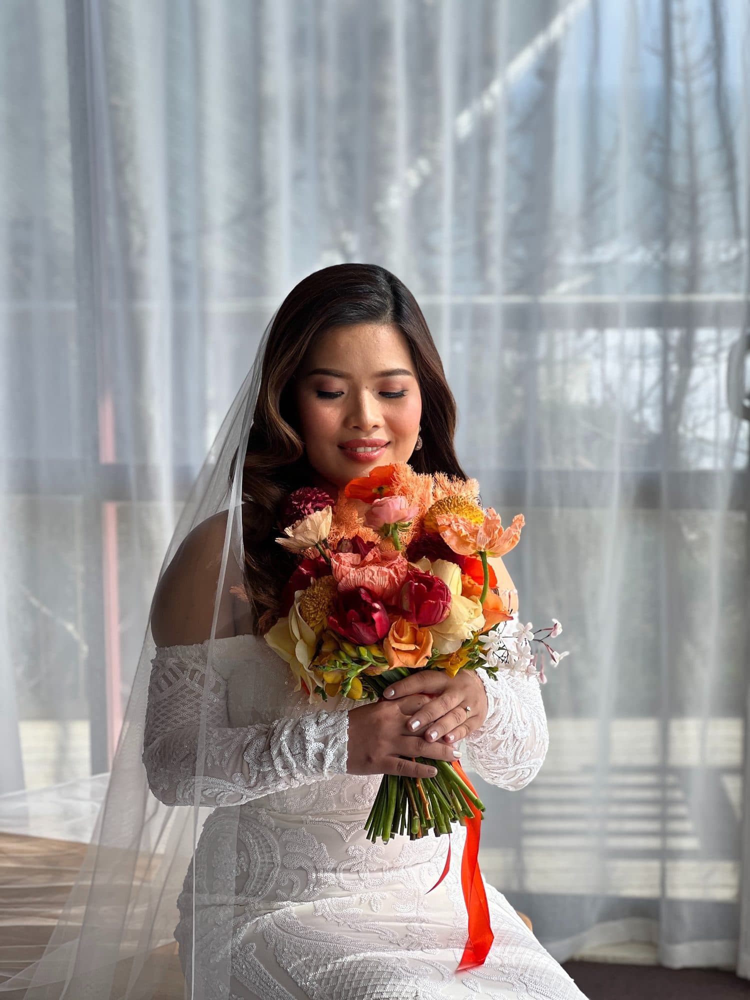 Luminous bridal glow with soft, romantic waves