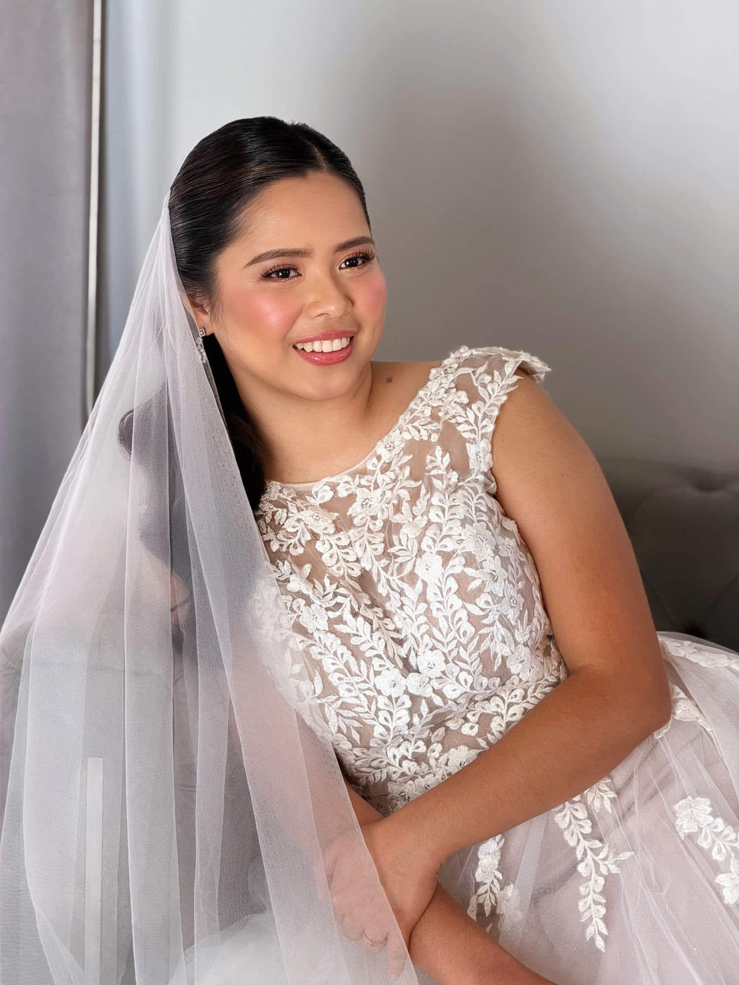 Bride with a radiant flush and a soft pink lip